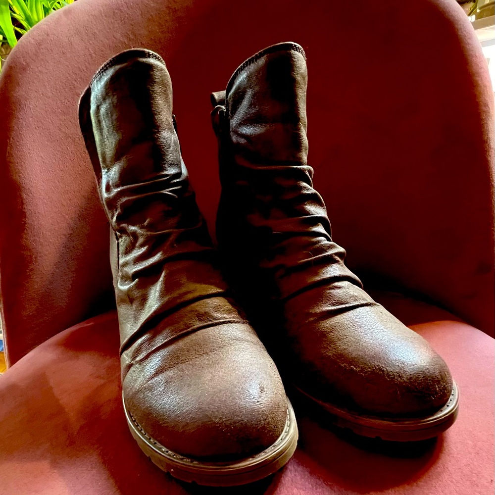 Ankle zip up healed boots. Very comfortable